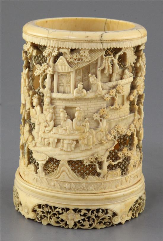 A Chinese ivory brush pot, early 19th century, height 15.8cm, old losses